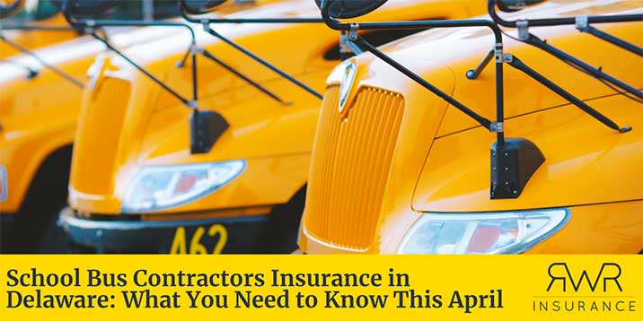 Yellow school buses lined up at an angle, with a focus on their front grills and mirrors - https://www.delawareschoolbusinsurance.com